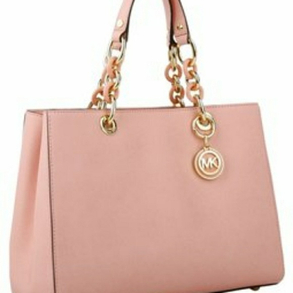 Michael Kors Handbags - Michael Kors Pink Satchel with gold embellishment